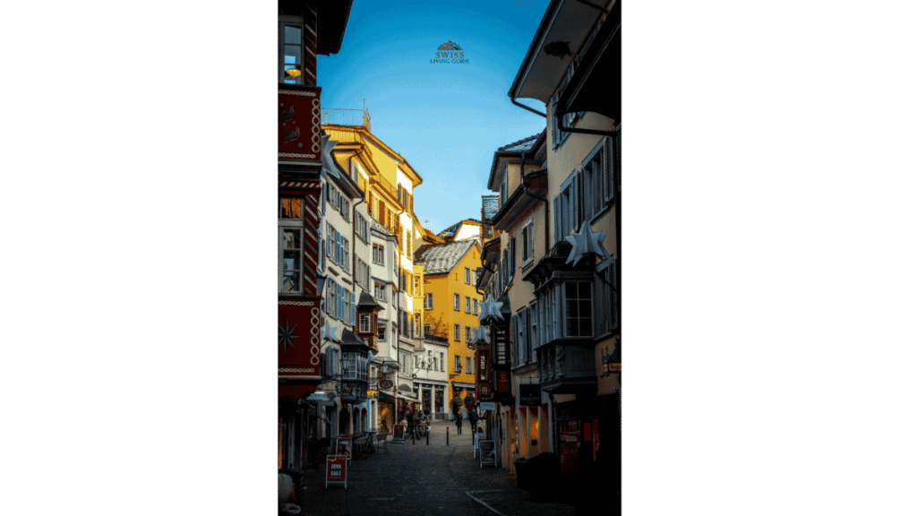 Cobblestone streets and colorful historic houses in Zurich Old Town along the Limmat River