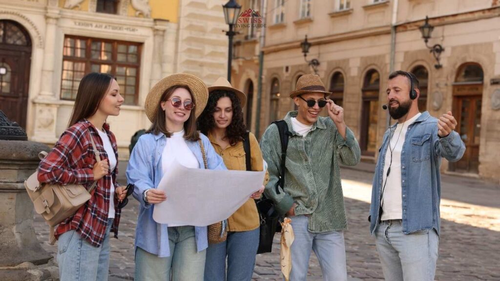 Small group of tourists exploring Zurich Old Town on a guided walking tour.