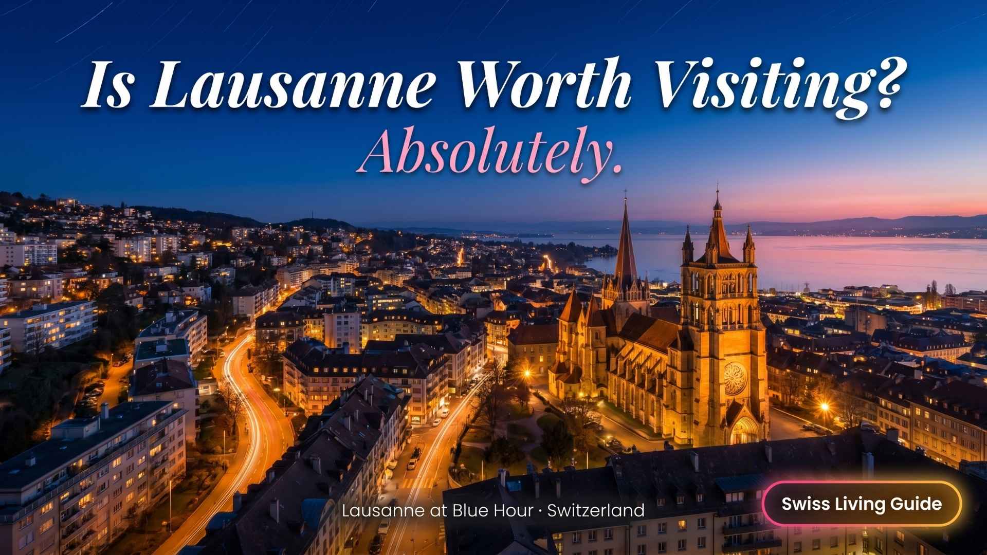 Blue hour cityscape of Lausanne with glowing lights beside Lake Geneva.